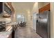 Modern kitchen with stainless steel appliances and granite countertops at 1510 Kinnard Cir, Ormond Beach, FL 32174