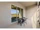 Screened lanai with table and chairs at 1510 Kinnard Cir, Ormond Beach, FL 32174
