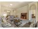 Living room features an open floor plan and view to kitchen at 1510 Kinnard Cir, Ormond Beach, FL 32174