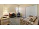 Home office with desk, chair, and sofa at 1510 Kinnard Cir, Ormond Beach, FL 32174