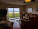 Living room with ocean view, comfortable seating at 2750 Ocean Shore Blvd # 4, Ormond Beach, FL 32176