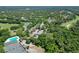 Aerial view of community with pool and tennis courts at 3238 Bailey Ann Dr, Ormond Beach, FL 32174