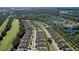 Aerial view of a residential community with homes, landscaping, and a golf course at 3238 Bailey Ann Dr, Ormond Beach, FL 32174