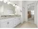 Bright bathroom features a double vanity and access to bedroom at 3238 Bailey Ann Dr, Ormond Beach, FL 32174