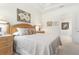 Comfortable bedroom with light walls, wood furniture, and a tranquil atmosphere at 3238 Bailey Ann Dr, Ormond Beach, FL 32174