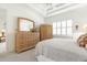 Bright bedroom featuring a dresser, large windows and neutral wall colors at 3238 Bailey Ann Dr, Ormond Beach, FL 32174