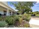 The clubhouse has a wrap around porch with landscaping at 3238 Bailey Ann Dr, Ormond Beach, FL 32174