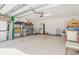 Attached garage with shelving and space for storage at 3238 Bailey Ann Dr, Ormond Beach, FL 32174