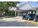 Golf cart parking and bag drop area at 3238 Bailey Ann Dr, Ormond Beach, FL 32174