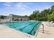 Community pool with lounge chairs at 3238 Bailey Ann Dr, Ormond Beach, FL 32174