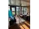 Cozy sunroom with decorative palm tree graphic at 5500 Ocean Shore Blvd # Ut61, Ormond Beach, FL 32176