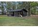 Rustic barn featuring sliding doors and an open interior layout at 7024 Sw 93Rd Street Rd, Ocala, FL 34476