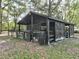 Functional barn with animal pens and ample storage space at 7024 Sw 93Rd Street Rd, Ocala, FL 34476