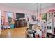 Spacious bedroom with a bunk bed, hardwood floors, and large windows letting in natural light at 7024 Sw 93Rd Street Rd, Ocala, FL 34476