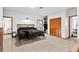 Spacious bedroom with neutral tones, tiled floors, closet and attached bath at 7024 Sw 93Rd Street Rd, Ocala, FL 34476