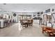 Bright and airy living space with a dining area, breakfast bar, and views of the backyard at 7024 Sw 93Rd Street Rd, Ocala, FL 34476