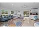 Open living space with a living room, sleeping area, and kitchenette, designed for flexible living at 7024 Sw 93Rd Street Rd, Ocala, FL 34476