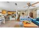 Open living room and kitchen with tile floors, and neutral color scheme at 1031 Calle Grande St, Ormond Beach, FL 32174