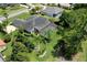 House with solar panels and pool, aerial view at 1068 Hampstead Ln, Ormond Beach, FL 32174