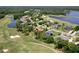 Community overview, showcasing homes near golf course and lake at 1068 Hampstead Ln, Ormond Beach, FL 32174