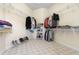 Large walk-in closet with ample shelving and hanging space at 1068 Hampstead Ln, Ormond Beach, FL 32174