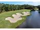 Picturesque golf course with water features at 1068 Hampstead Ln, Ormond Beach, FL 32174