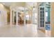 Bright living room with high ceilings and columns at 1068 Hampstead Ln, Ormond Beach, FL 32174