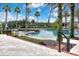 Relaxing pool area with palm trees and brick walkways at 1068 Hampstead Ln, Ormond Beach, FL 32174