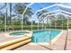 Inviting screened pool and spa area at 1068 Hampstead Ln, Ormond Beach, FL 32174