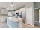 Modern kitchen featuring an island, stainless steel appliances, and white cabinetry at 211 Oak Lane Loop, Ocala, FL 34472