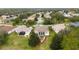 Aerial view of a house and surrounding neighborhood at 4546 Nottoway Dr, Leesburg, FL 34748