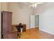 Spacious home office features built-in desk and hardwood floors at 4546 Nottoway Dr, Leesburg, FL 34748