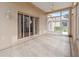 Sunroom with sliding glass doors leading to the dining area at 4546 Nottoway Dr, Leesburg, FL 34748