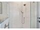 Shower with modern fixtures and marble-look tile at 59 Cunningham Dr, New Smyrna Beach, FL 32168