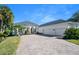 Two-car garage and welcoming front entrance at 59 Cunningham Dr, New Smyrna Beach, FL 32168