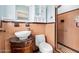 Bathroom with peach tile, pedestal sink, and shower at 142 Seton Trl, Ormond Beach, FL 32176