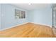 Simple dining area with hardwood floors and light blue walls at 142 Seton Trl, Ormond Beach, FL 32176