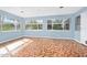 Sunroom with tile flooring and multiple windows at 142 Seton Trl, Ormond Beach, FL 32176