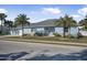 Single-story home with blue siding at 149 Sunrise Cove Cir, Ormond Beach, FL 32176