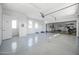 Spacious garage with epoxy flooring and storage at 149 Sunrise Cove Cir, Ormond Beach, FL 32176