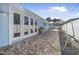 Brick paved patio area leading to the pool at 149 Sunrise Cove Cir, Ormond Beach, FL 32176