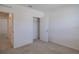 Well-lit bedroom with closet and carpet flooring at 200 Duke Dr, Deland, FL 32724