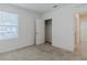 Bright bedroom with carpeted floor and spacious closet at 200 Duke Dr, Deland, FL 32724