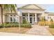 Community clubhouse entrance with columns and landscaping at 200 Duke Dr, Deland, FL 32724