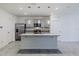 Modern kitchen with island and stainless steel appliances at 200 Duke Dr, Deland, FL 32724