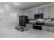 Modern kitchen with granite countertops and island at 200 Duke Dr, Deland, FL 32724