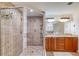 Well-appointed bathroom with double vanity and walk-in shower at 2403 S Atlantic Ave # 309, Daytona Beach, FL 32118