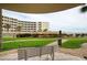 Peaceful courtyard with lush landscaping and ocean views at 2403 S Atlantic Ave # 309, Daytona Beach, FL 32118