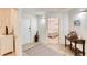 Bright condo entryway with view of bedroom and decorative elements at 2403 S Atlantic Ave # 309, Daytona Beach, FL 32118