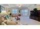 Bright living area features comfortable seating, ocean view, and hardwood floors at 2403 S Atlantic Ave # 309, Daytona Beach, FL 32118